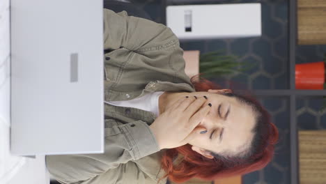 vertical video of business woman falling asleep.