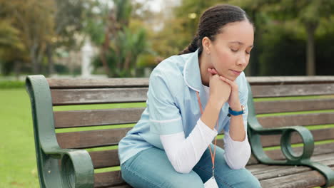 Sad,-tired-and-nurse-with-woman-on-park-bench