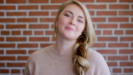 happy, face and woman student by brick wall