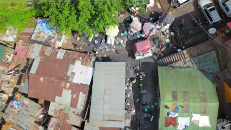 dirty house roofs of slum local village near bugolobi in kampala, uganda