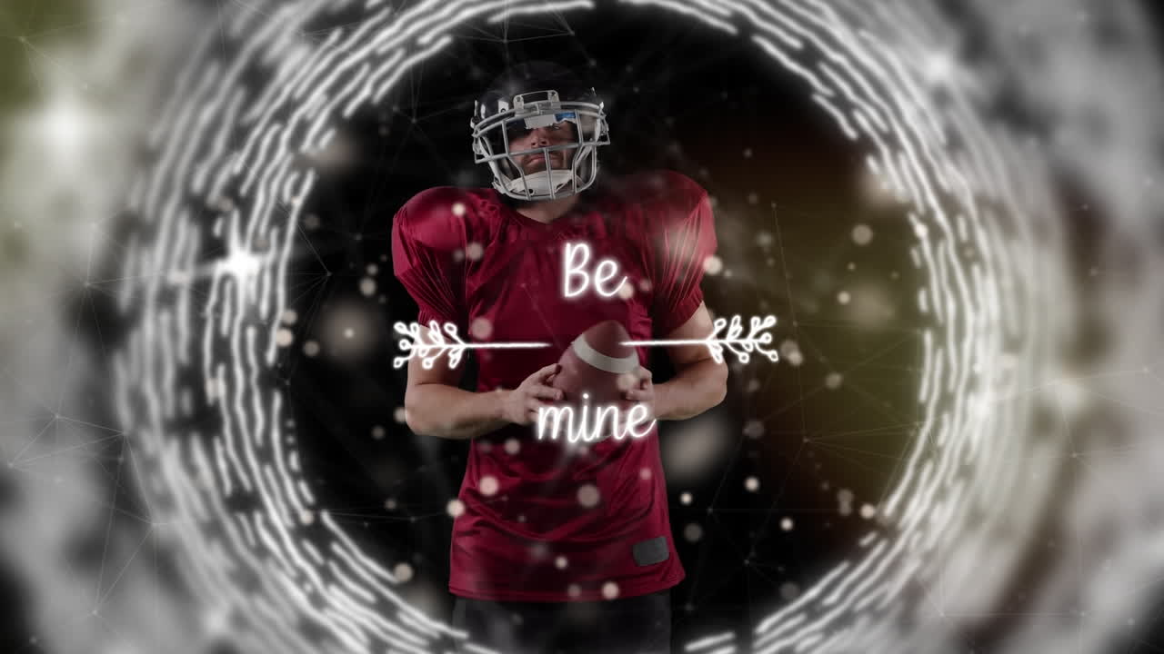 Animazione di un cerchio e del testo sii mio su giocatore di football americano maschio caucasico con palla
