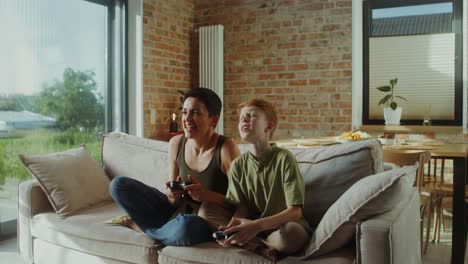 mother and son playing video games