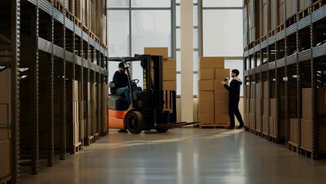 Warehouse operations with forklift and workers managing inventory