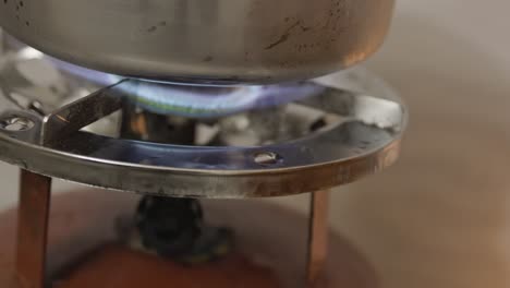 cooking-at-copper-Single-Burner-Gas-Stove-at-home-at-day-close-view