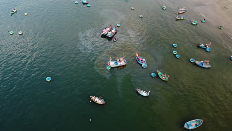 fuel leak from a local fishing vessel anchored on coastline, vietnam