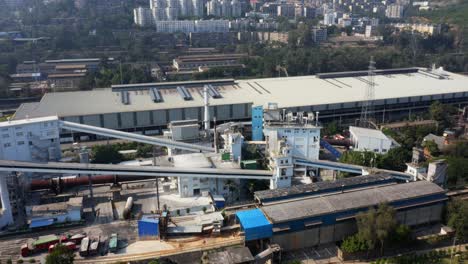 drone shot of an industrial city located in the valley of sichuan, china