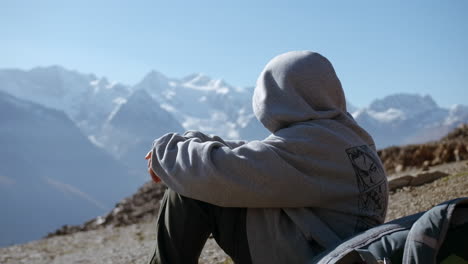 child hiking in the mountains