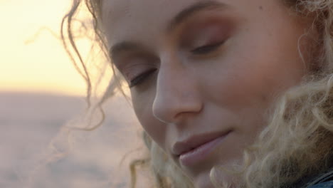 close-up-portrait-of-beautiful-blonde-woman-looking-confident-enjoying-relaxed-vacation-lifestyle-feeling-freedom-on-seaside-at-sunset