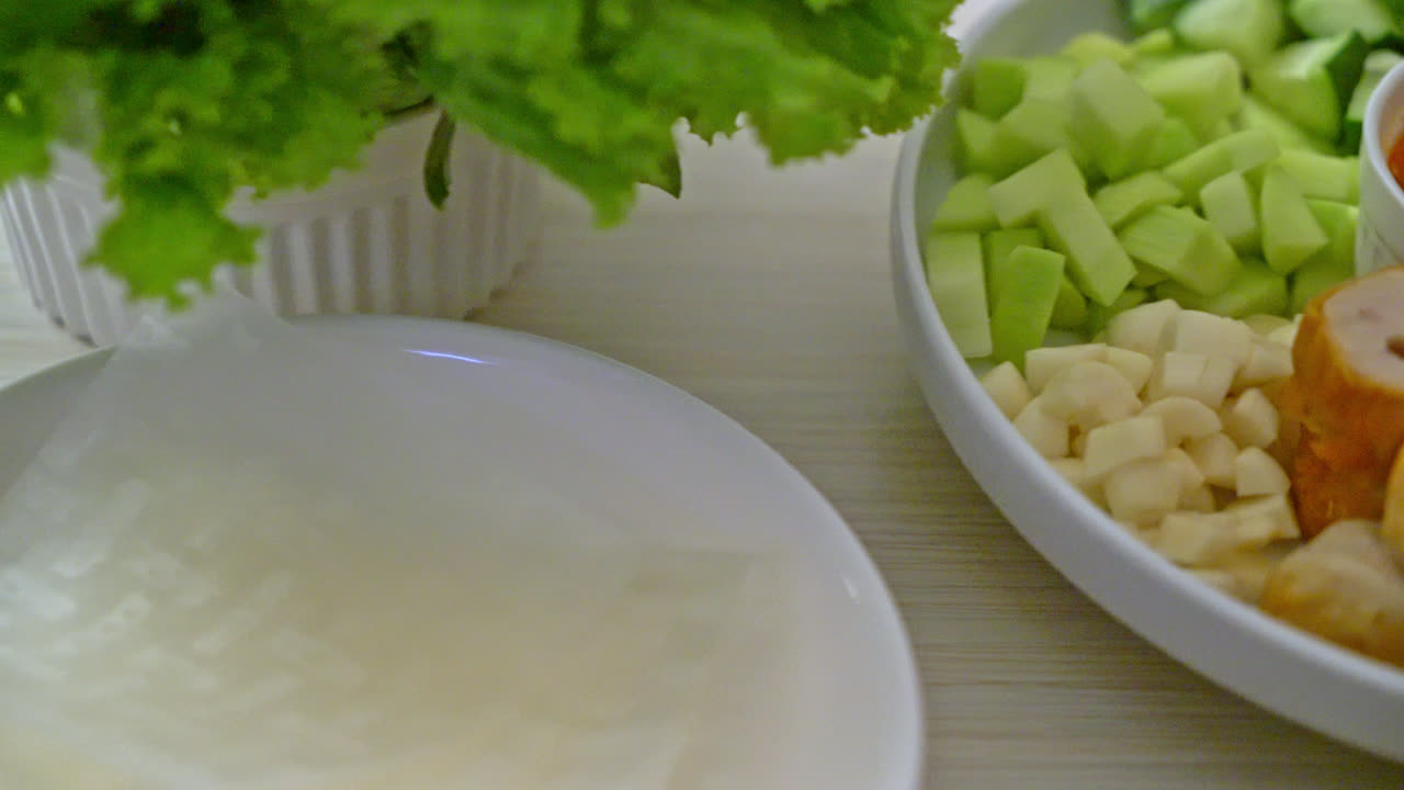 Vietnamese pork meatball with vegetables wraps (Nam-Neaung or Nham Due) - vietnamese traditional food culture
