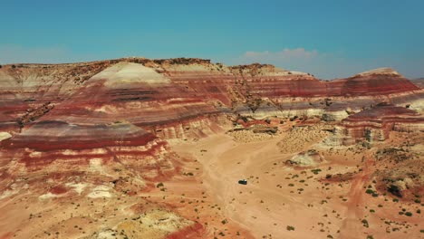 Bentonite-Hills-Near-Hanksville,-Utah-On-A-Sunny-Day---aerial-drone-shot