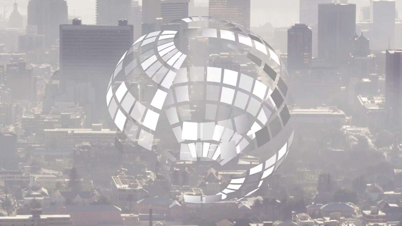 Reflective globe appearing over hazy skyline, rotating tiles sliding, recombining to form sphere