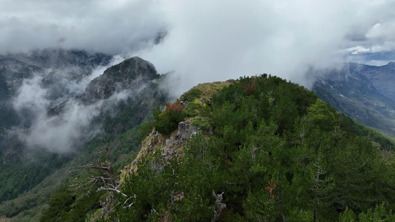 Forested Cloud Covered Mountain Top - Aerial Orbit Theth National Park
