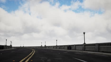 long bridge in misty fog