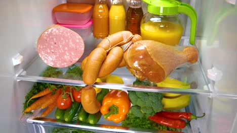 Open-refrigerator-filled-with-food