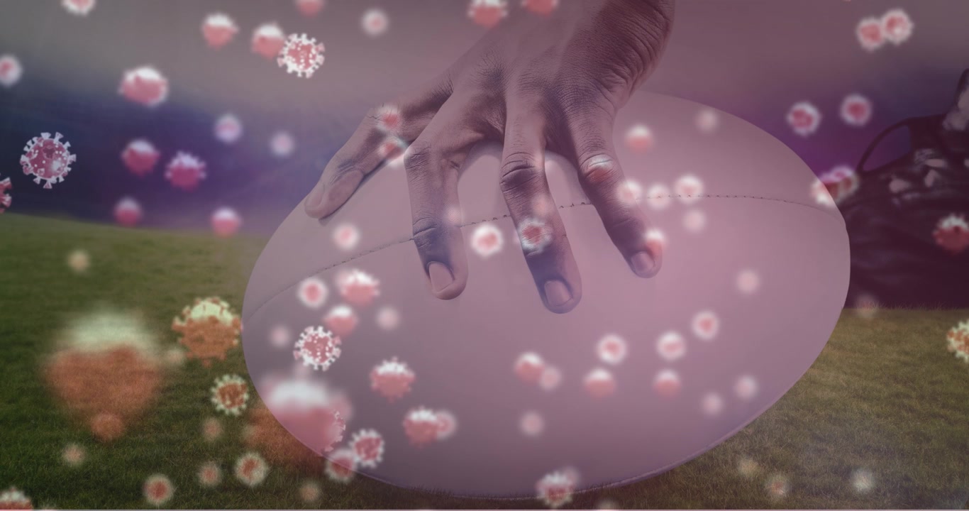 Animation of covid cells over person washing hands