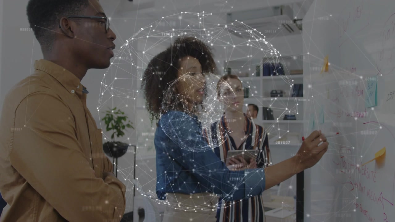 Vertical video: Starting office plan woman in blue writing on board, checking tablet with overlay