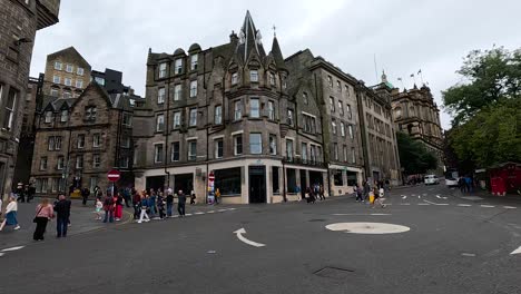 crowd watching a street performer in edinburgh