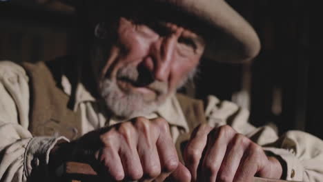 close-up portrait of a senior cowboy