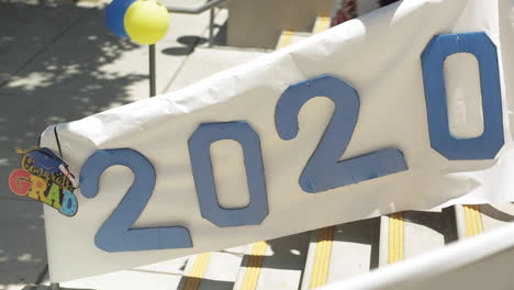 2020 graduation sign on front steps of elementary school