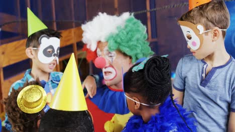 clown interacting with the kids during birthday party 4k