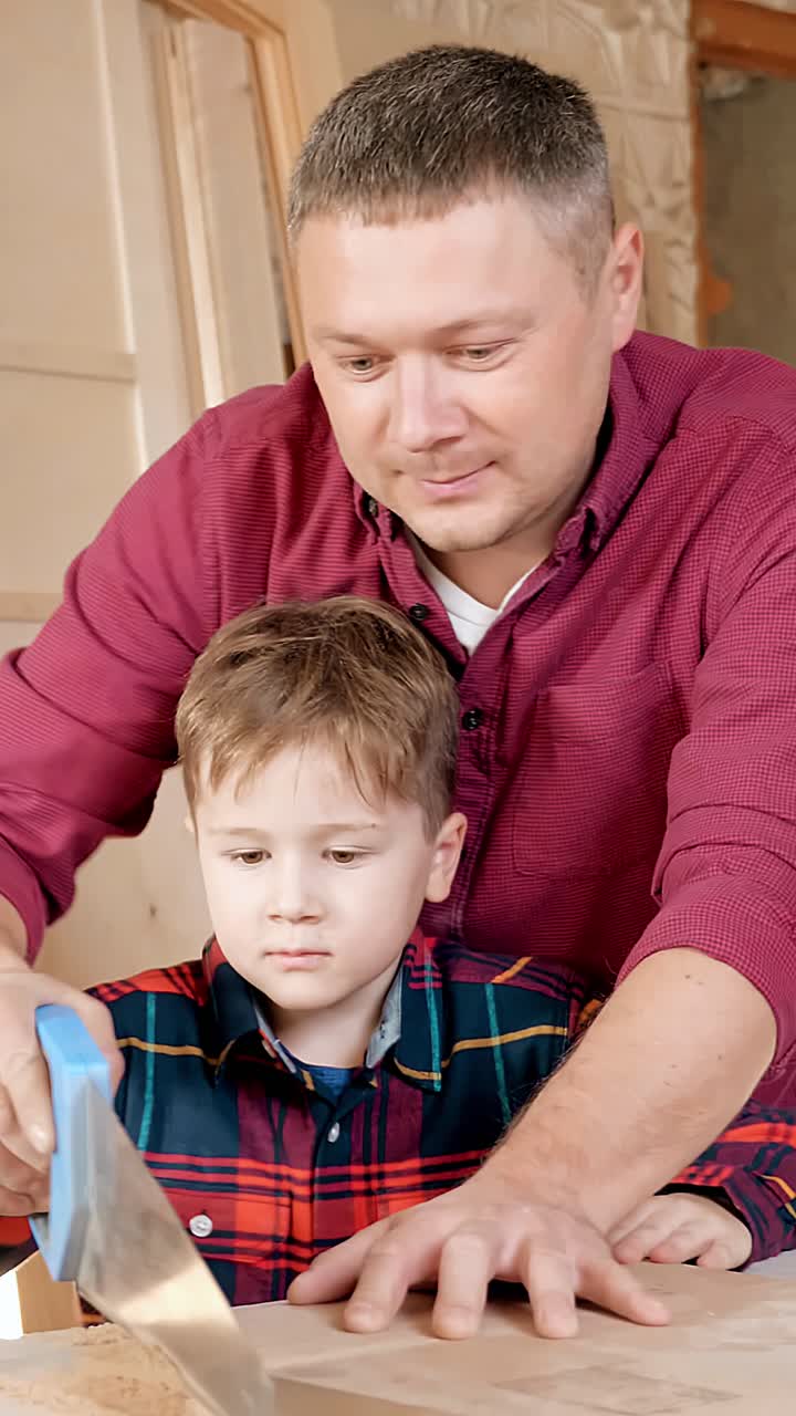 Father and son working together on woodworking project, demonstrating craftsmanship and bonding experience in a bright workshop environment with tools