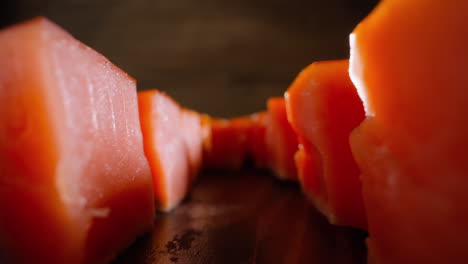 motion between lines of tasty cool smoked salmon cubes