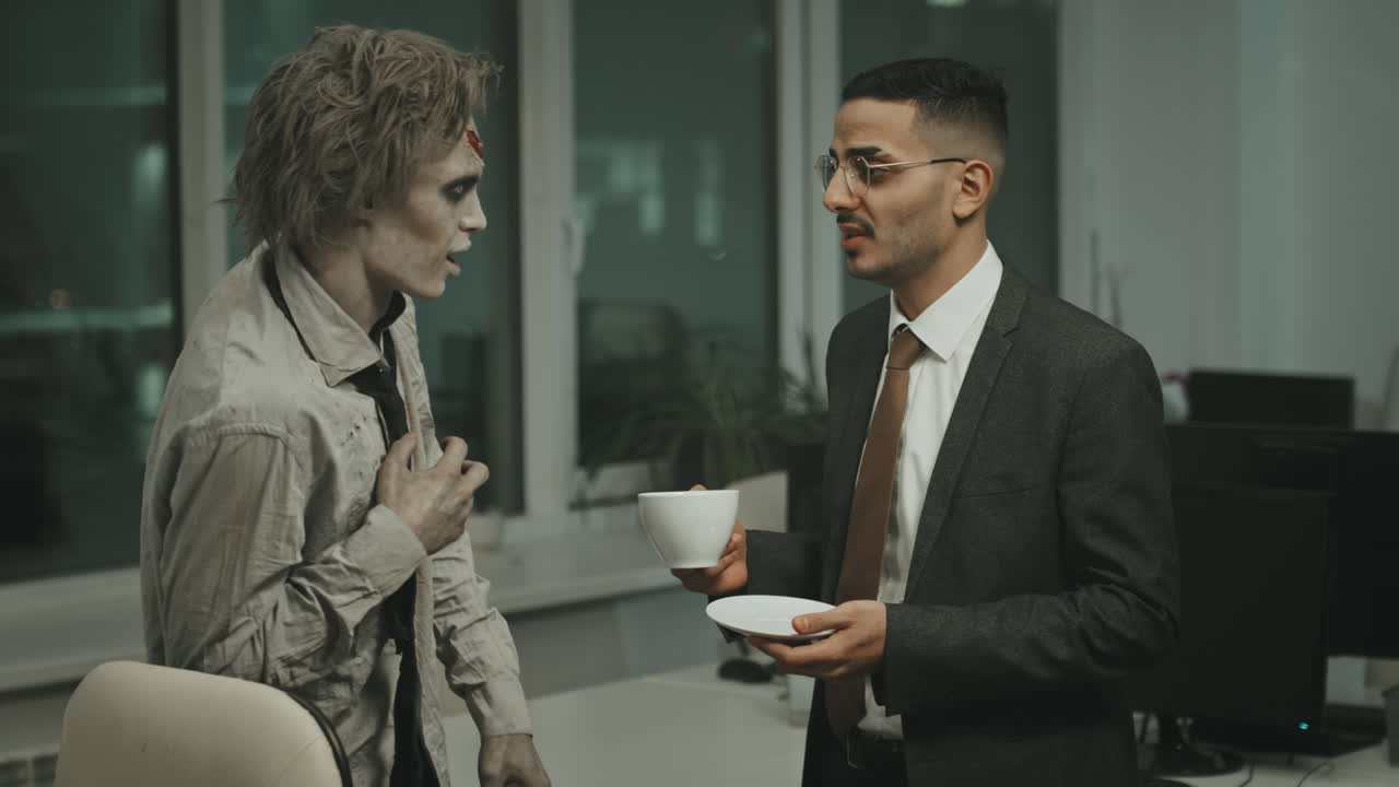 Businessman Talking to Zombie Man in Office