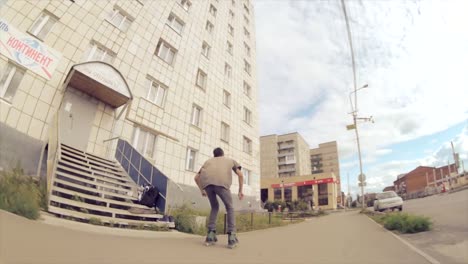 man rollerblading in urban environment