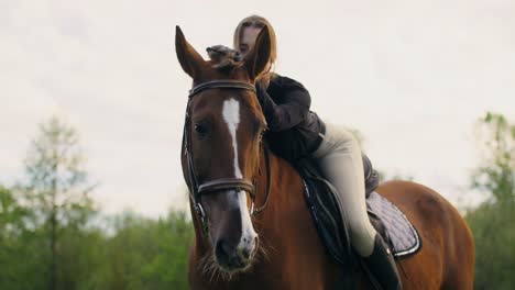 woman and horse in the countryside