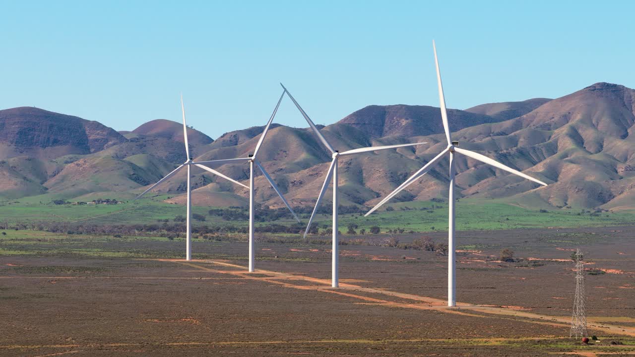 Aerial telephoto drone flyover showing wind turbines near Port Augusta, South Australia