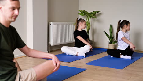 kids practising yoga