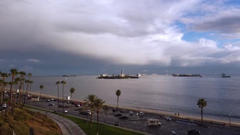 Aerial-shot-looking-at-Island-White-with-docking-ships-and-cloudy-background