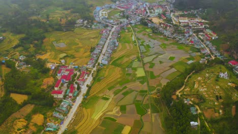 Slow-tilt-up-revealing-gorgeous-lush-farmland-in-the-Dong-Van-Karst-plateau-geopark