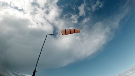 orange beach safety wind sock measuring windy weather