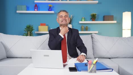 home office worker man suffering from sore throat.