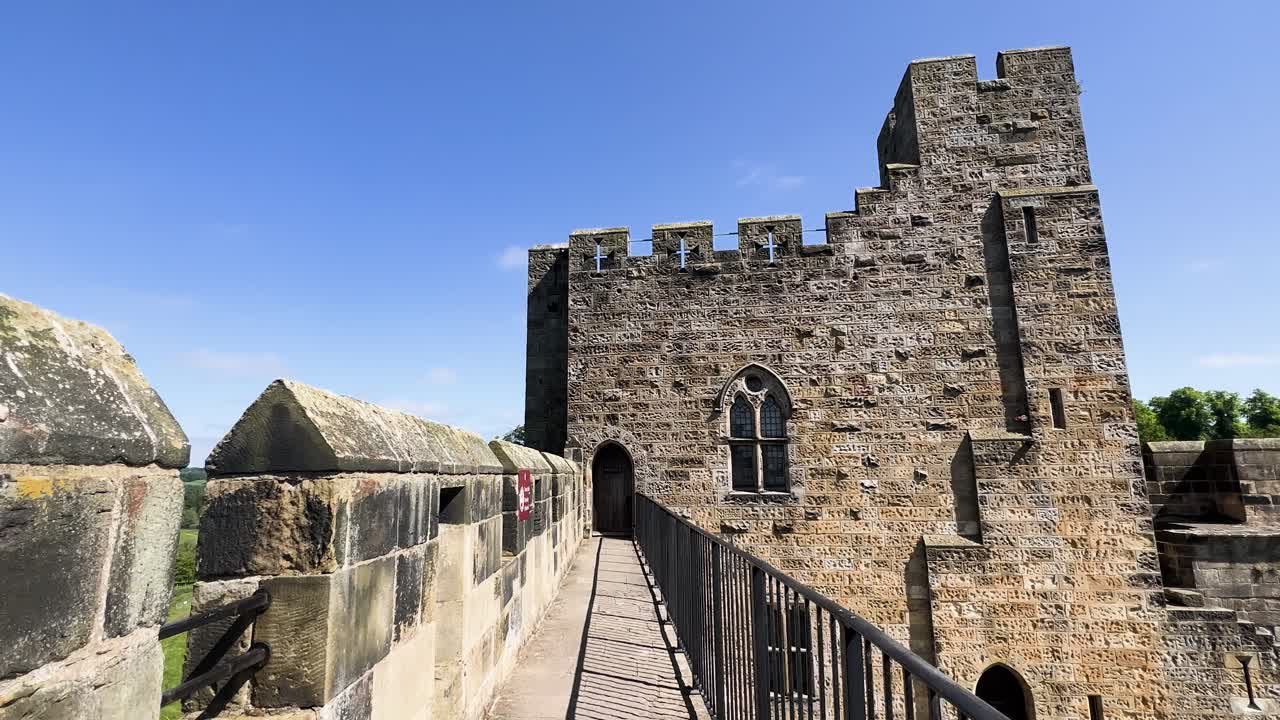 Walking Along Alnwick Castle Wall
