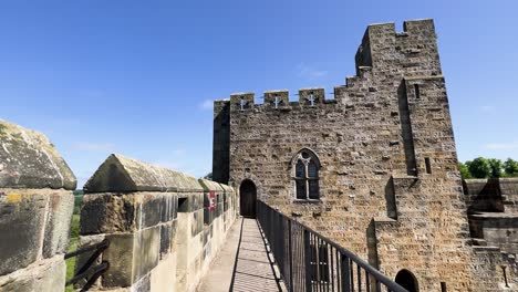 walking along alnwick castle wall