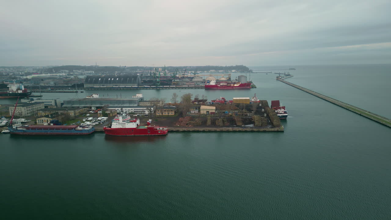 Aerial view of a port with ships and industrial infrastructure