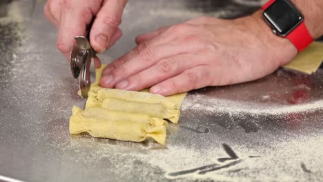 making homemade tortellini