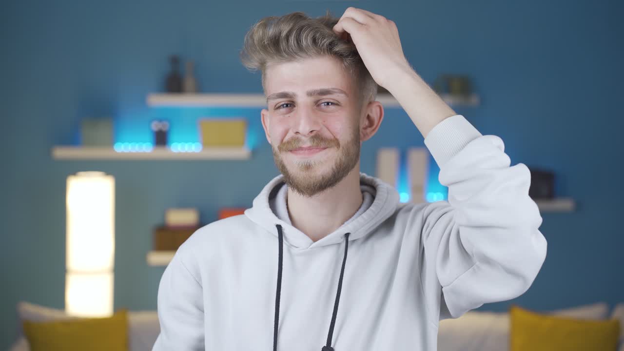 친절하고 매력적인 젊은이의 초상화.