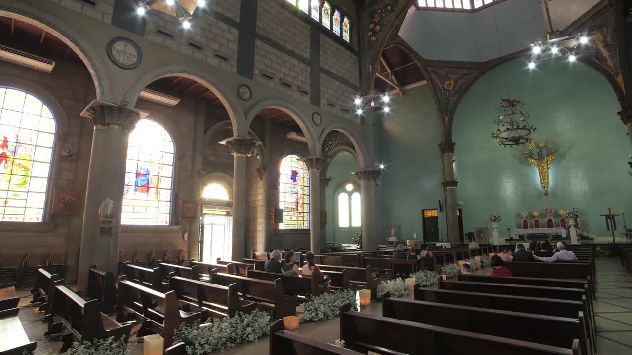 Walking Inside a Catholic Church with Sunbeams Through the Windows