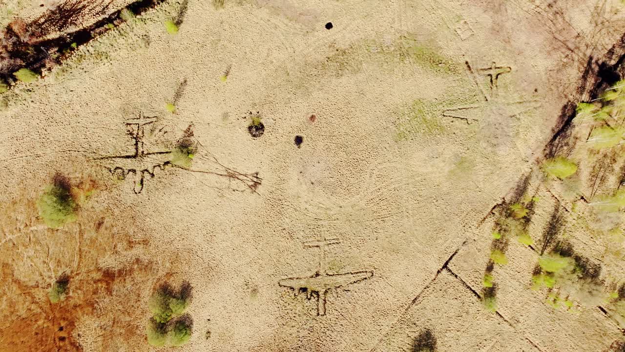 Soviet-era decoy airfield with visible bomber plane trenches near Liepaja Latvia