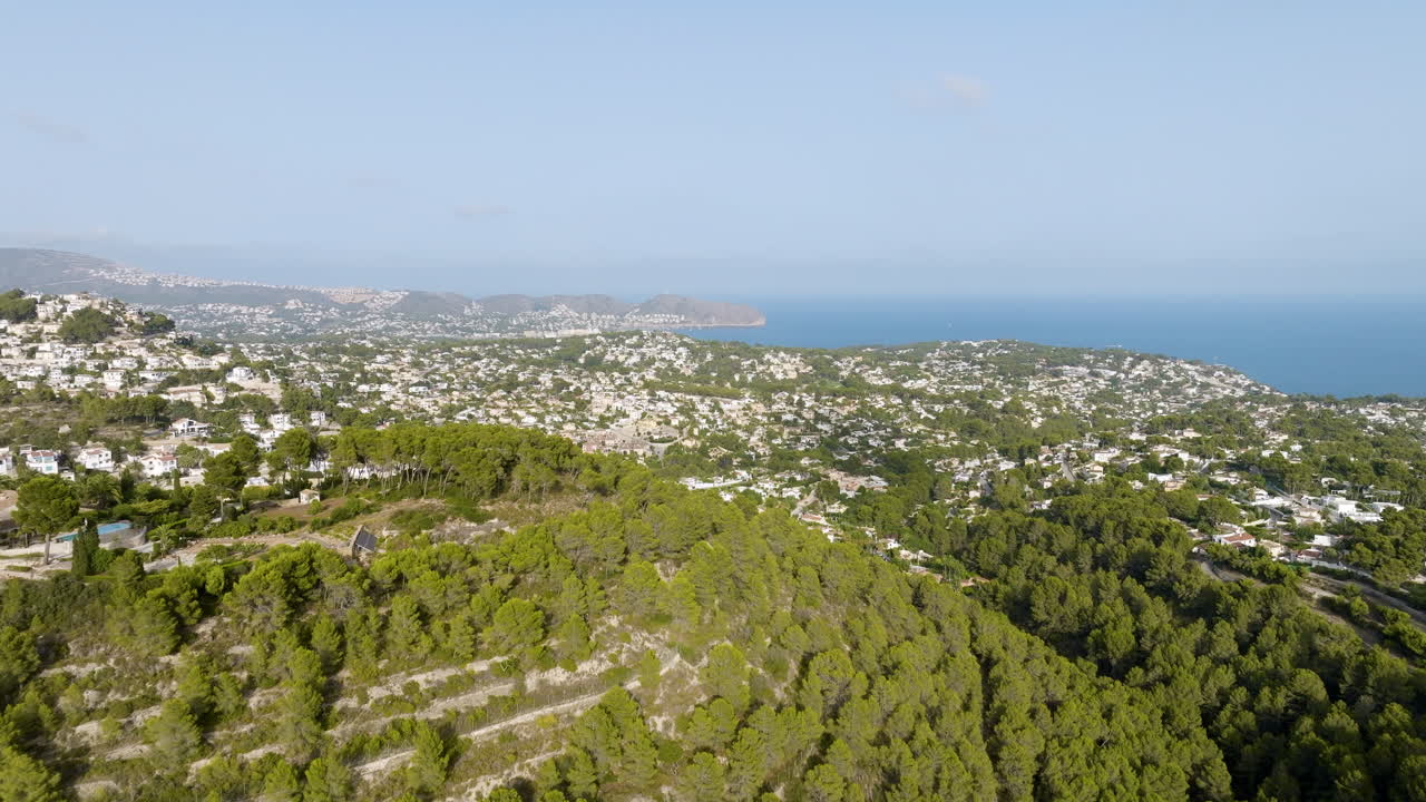 Coastal Mediterranean Town with Mountains and Sea