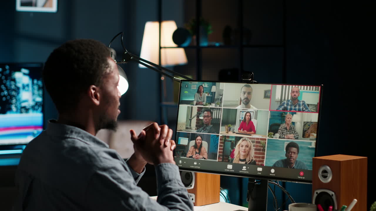 Colleagues attending a virtual webinar on pc from their homes