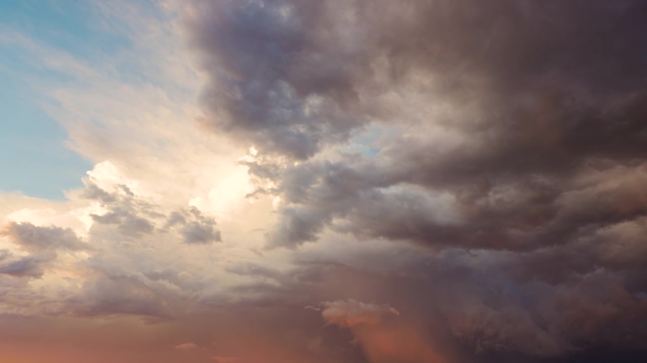 Peaceful clouds moving slowly in seamless motion background loop