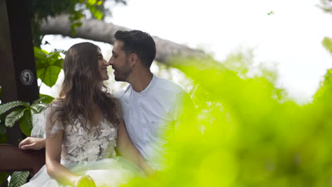 couple kissing in a park