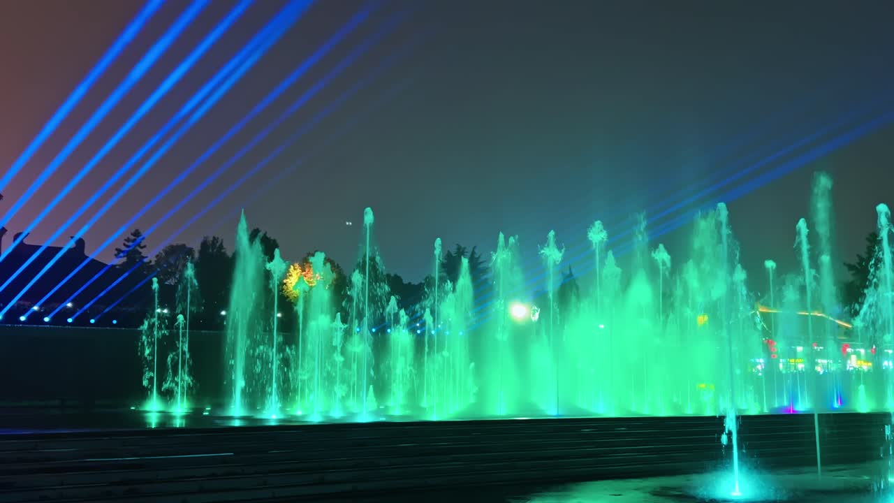 A Stunning View of the Musical Fountain and Colorful Lights at the Giant Wild Goose Pagoda in Xi'an, China - Close Up