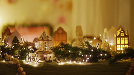 table decorated with christmas decorations twinkling lights and glitter