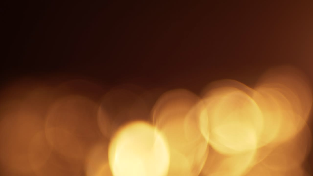 Varmt gyllene bokeh-ljusläckage övergångsöverlägg