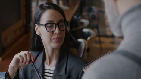 business conversation in a coffee shop